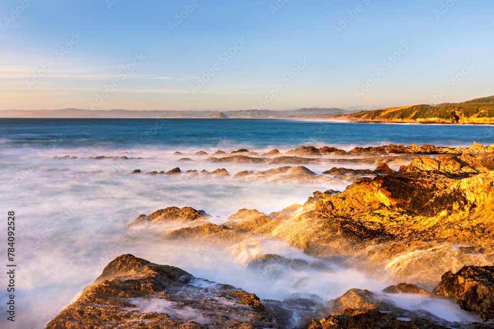 Long exposure over ocean, rocks, shore, waves Long exposure over ocean, rocks, shore, waves