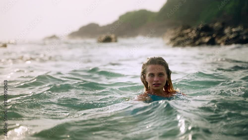 custom made wallpaper toronto digitalElegant woman bathes in sun-drenched sea, dress flowing in salty breeze on picturesque beach. Waves caress, she relishes serene dip, epitome of summer beauty, ocean leisure time. Slow motion.