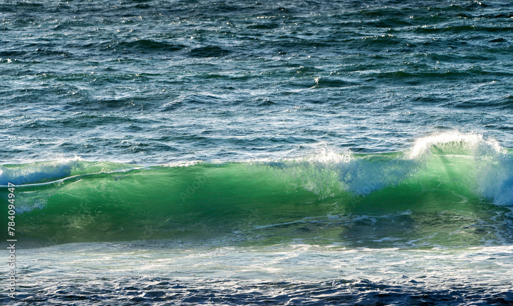 Fototapeta premium Light through waves at ocean