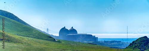 Nuclear power plant with rolling green hills
