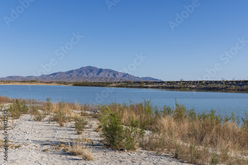 lake and mountains in the desert