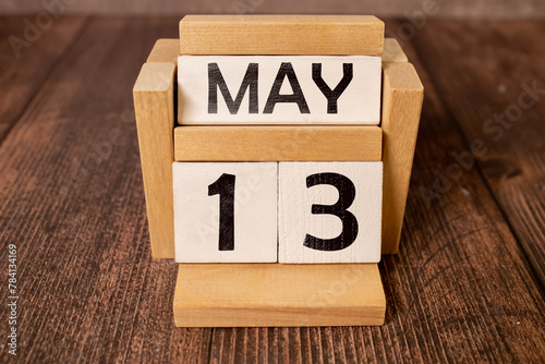 13 Thirteenth day May Month Calendar Concept on Wooden Blocks. Close up. photo