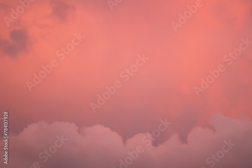 Detail of redish and violet cloudscape pattern on evening sky photo