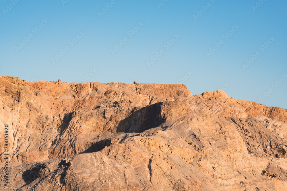 cliff stone with blue sky background
