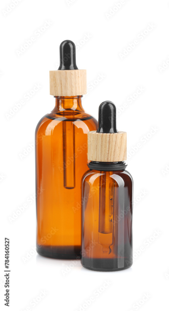 Glass bottles of tincture isolated on white