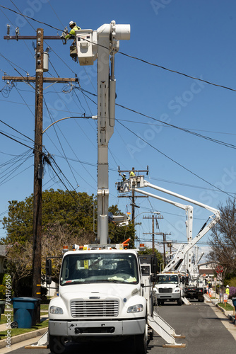 Vertical of man working on power lines