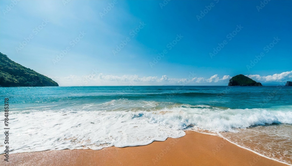 Summer seascape beautiful waves, blue sea water in sunny day. Top view from drone. Sea aerial view, amazing tropical nature background. Beautiful bright sea with waves splashing and beach sand
