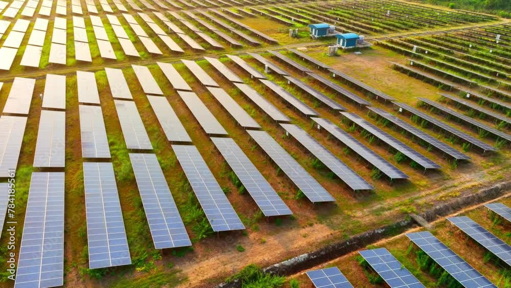 Behold the symphony of sustainability as rows of sleek photovoltaic panels dance under the sun's embrace, harmonizing to compose renewable energy from a bird's eye view.
Behold the symphony of sustainability as rows of sleek photovoltaic panels dance under the sun's embrace, harmonizing to compose renewable energy from a bird's eye view.
