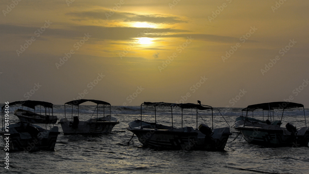 tour and fishing boats at hikkaduwa beach