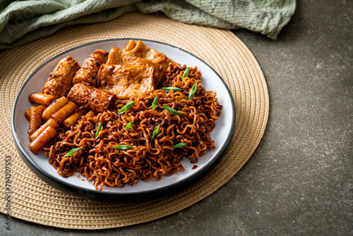 Jajangmyeon or JJajangmyeon with Odeng and Omuk - Korean Instant noodles with Korean fish cake in black bean sauce photo