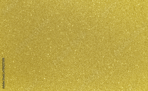 Golden yellow glitter bokeh background. Photo can be used for New Year, Christmas and all celebration concepts. 