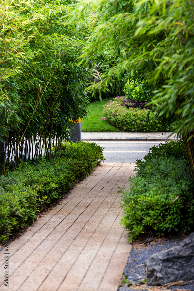 Fototapeta premium Garden path near the highway