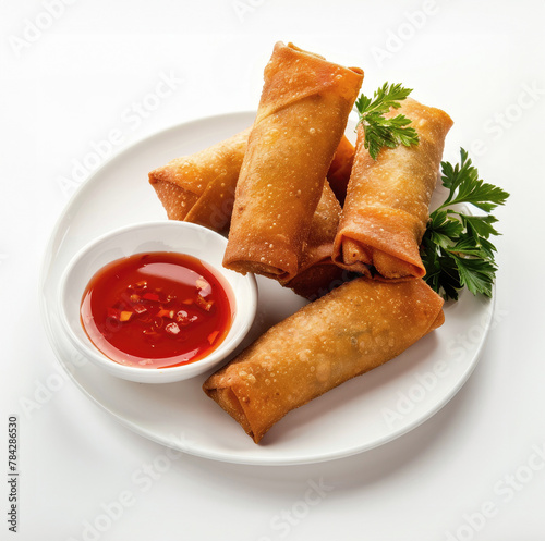 Deep fried spring rolls and sweet and sour sauce. Oriental dish