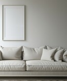 White couch in living room by window