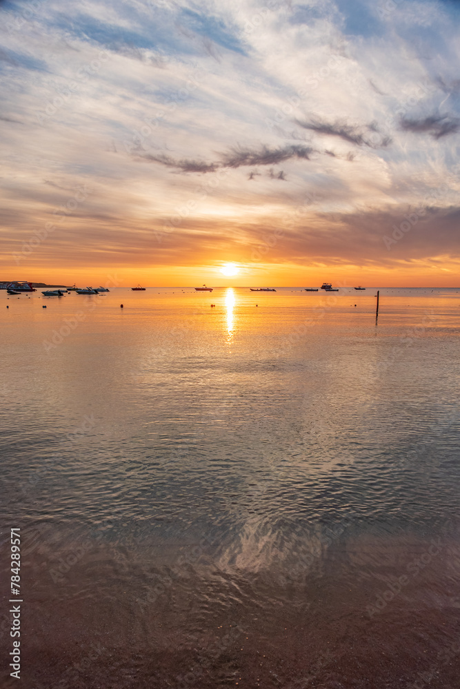 Beautiful red and orange sunrise over the sea. Beautiful red and orange sunrise over the sea.