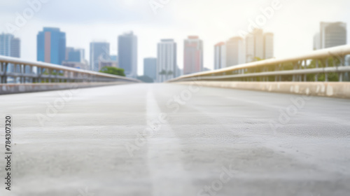 Selective focus   Empty road floor surface with modern city landmark buildings  a safety on road