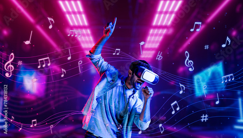 Man singing a song by using VR headset at simulated neon club. Relaxed person singing a song and holding microphone gesture while enter virtual reality simulated world. Blurring background. Deviation. © Summit Art Creations