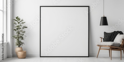 Thin black frame mockup on a white studio wall