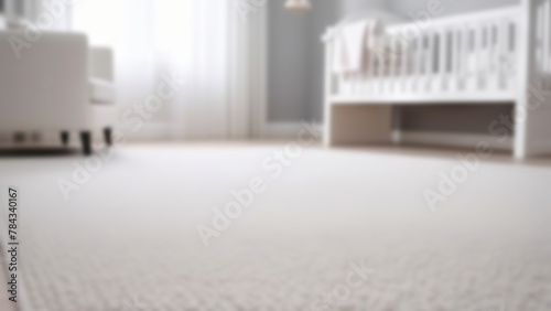 Blurred view of modern stylish baby room interior. Home interior decoration in children's bedroom. Low angle from carpet