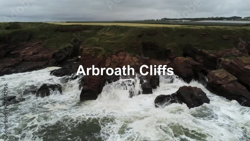 Slow-motion of waves washing the Arbroath Cliffs and splashing photo