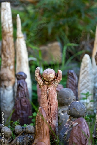 Vertical shot of old clay figures in the Shiststone town of Cadeira in Portugal in daylight