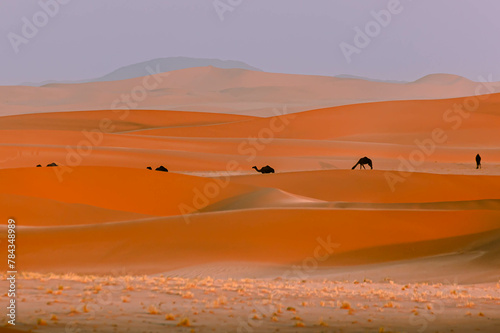 AI-generated illustration of A group of camels in the desert during sunset