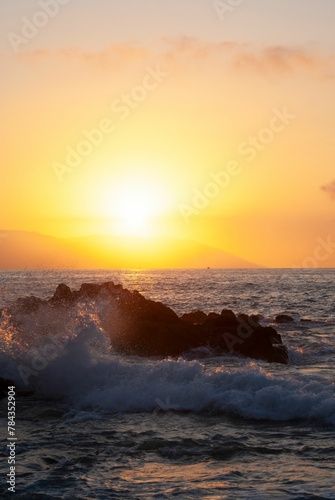 Sunrise view over a seascape with a clear sky background