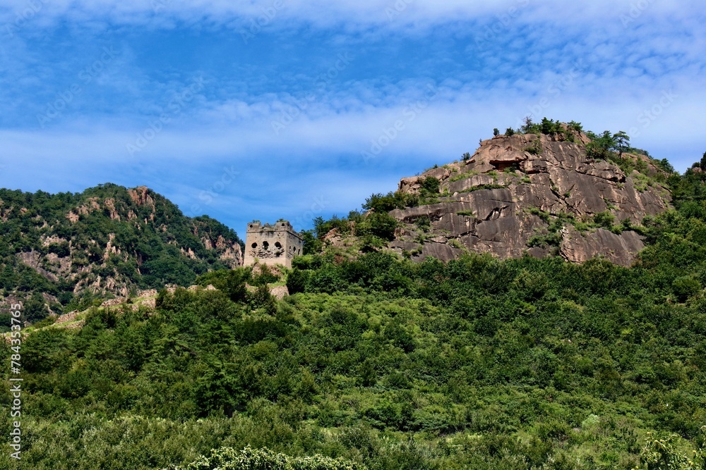 Old fort on a mountain between massive outcrops