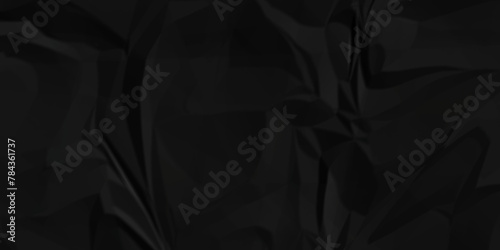 Dark black crumple paper wrinkled poster template ,blank glued creased paper texture background. black paper crumpled backdrop background. used for cardboard.