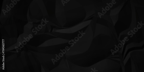 Dark black crumple paper wrinkled poster template ,blank glued creased paper texture background. black paper crumpled backdrop background. used for cardboard.