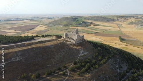 Aerial view of the Castle of Castrojeriz on a hill © Wirestock