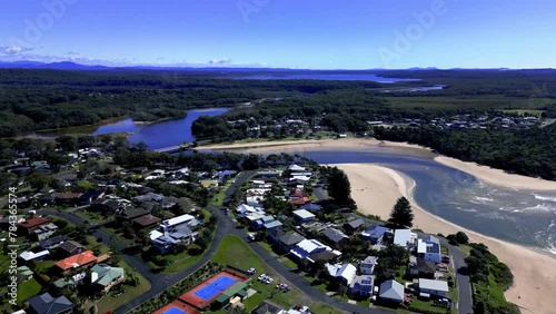 Aerial view of cityscape New South Wales surrounded by buildings and water photo