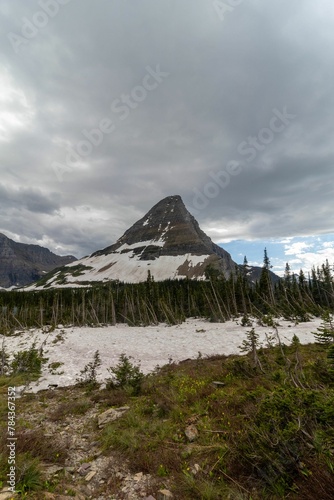 Amazing shot of a mountain covered in snow in Glacier National Park in Montana, USA © Wirestock