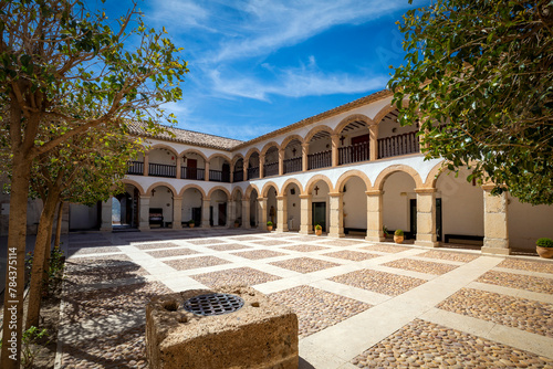 Generic view of the baroque cloister of the Sanctuary of Vera Cruz in Caravaca, Region of Murcia, Spain with midday light photo