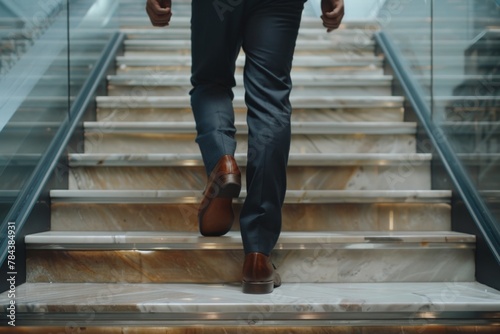 A man in a suit walking up a flight of stairs. Suitable for business concepts