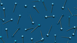 Detail of blue sewing pins on blue textile background