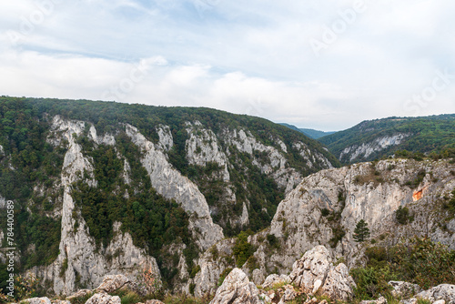 Zadielska tiesnava gorge with steep rocky slopes above from Zadielska planina in Slovensky kras national park in Slovakia