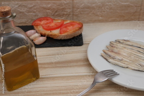 boquerones vinagre casero tosta tomate y ajo