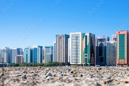 A modern new city rises straight out of the desert sands, satellite developments. Abu Dhabi. - civilizational oasis and urbanized environment concept photo