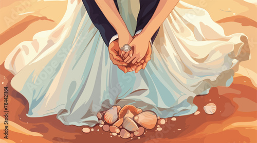 Hands dressing a wedding ring rings in the sand rin photo
