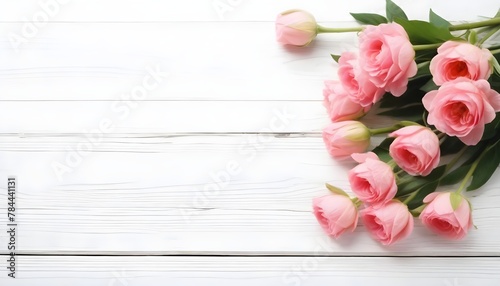 Flowers-composition-for-Valentine-s--Mother-s-or-Women-s-Day--Pink-flowers-on-old-white-wooden-background--Still-life-.jpg © Malik