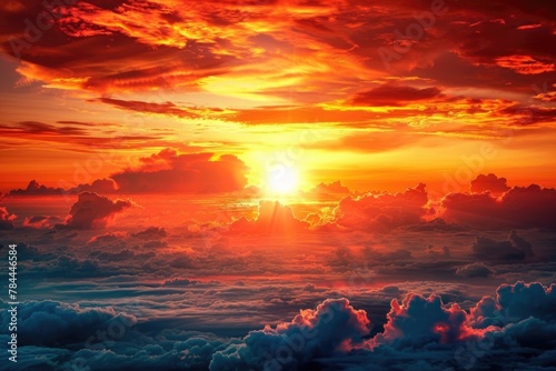 A beautiful sunset scene with clouds in the sky. Ideal for various design projects
