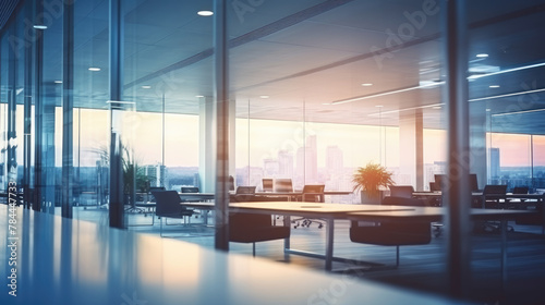 Beautiful blurred background of a light modern office interior with panoramic windows and beautiful lighting, bright lighting