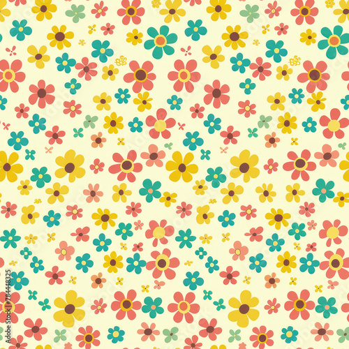A colorful floral pattern with yellow, pink, and green flowers. The flowers are scattered throughout the image, creating a vibrant and cheerful atmosphere