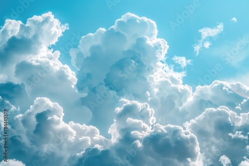 A plane flying through a cloudy blue sky, suitable for travel concepts