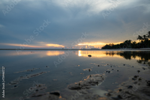 sunset les pieds dans l'eau