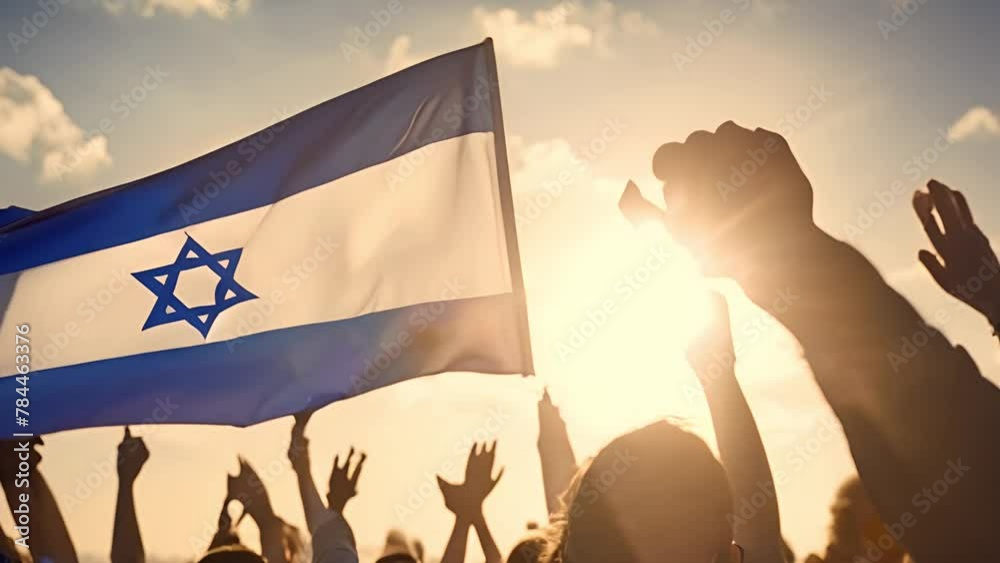 Crowd with Israel flag in protest raising arms, Raised fists of men against the background of the flag of Israel painted on the wall, the concept of popular unity and the opinion of the majority. War 