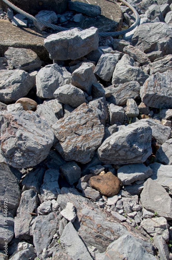 Limestone rocks and a steel cable