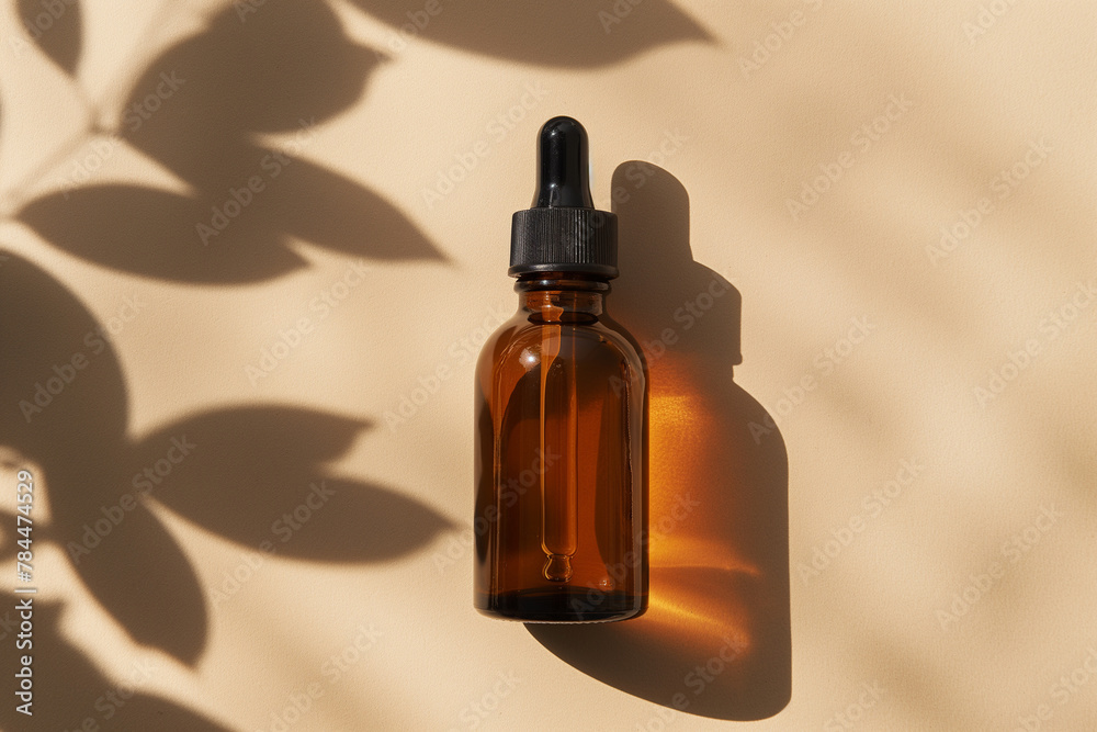 Amber glass serum bottle with dropper, botanical shadow overlay, beauty product mockup.