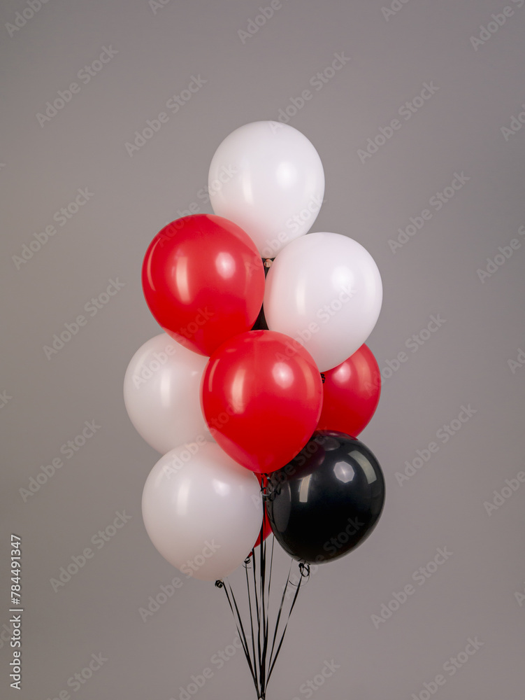 Fountain of balloons with helium on a gray background Fountain of balloons with helium on a gray background
